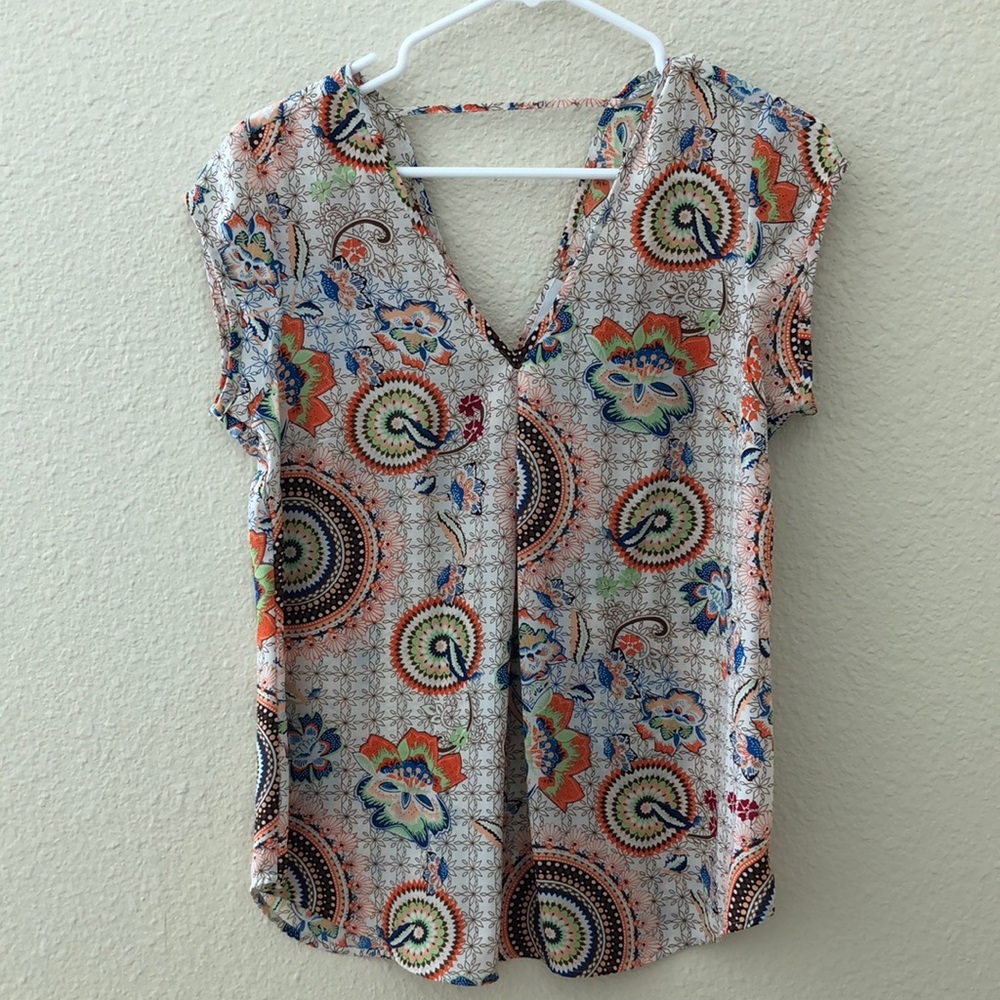 Blouse with cap sleeves
